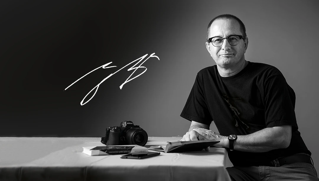 Mario_Becker_EBV_K Mario Becker mit Kamera - Das Bild enthält auch seine Unterschrift